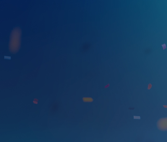 Multi-colored confetti on blue background