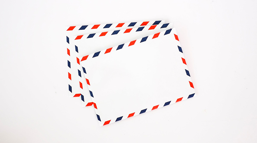 Three envelopes with striped borders