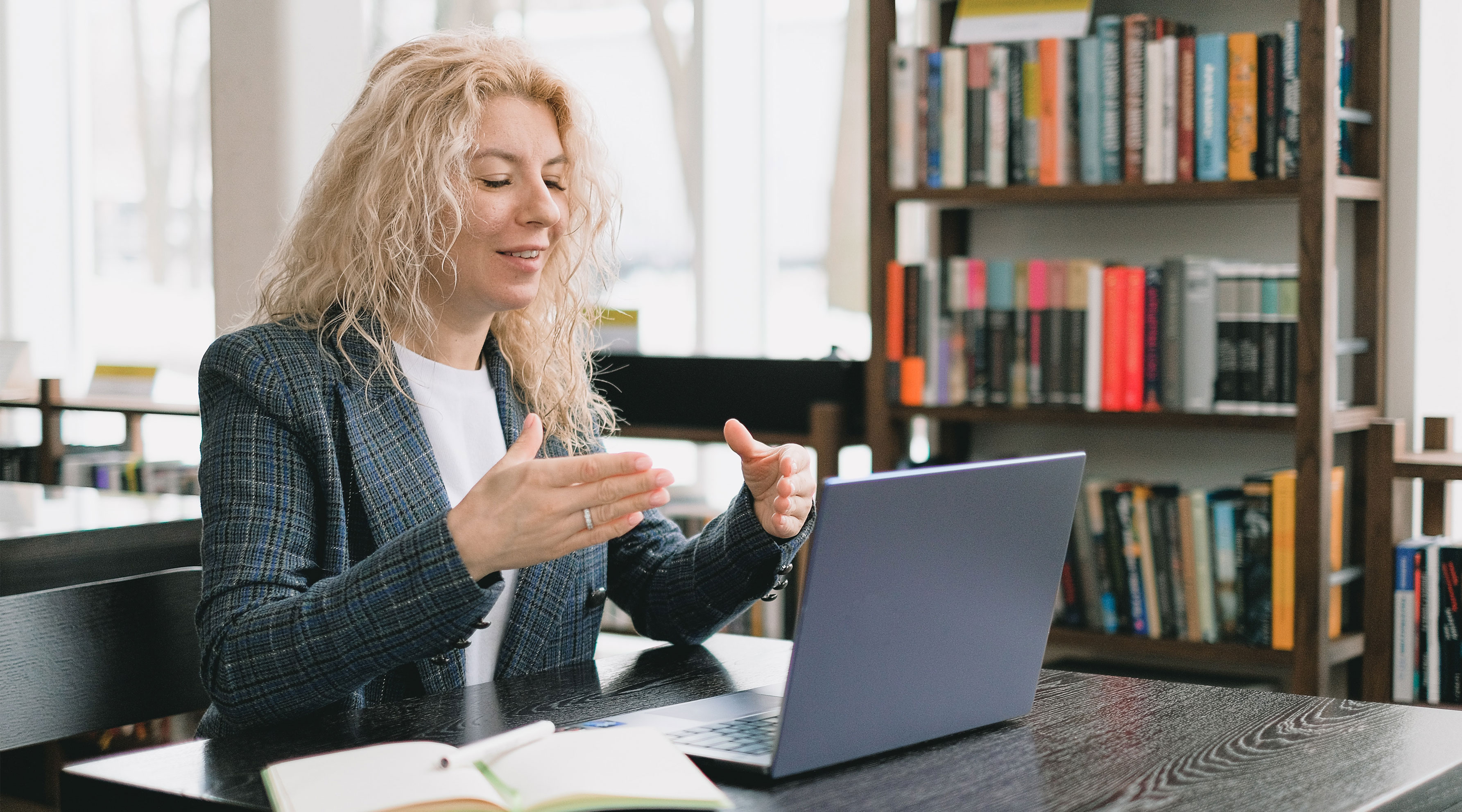 Woman being interviewed on a laptop during a virtual career fair