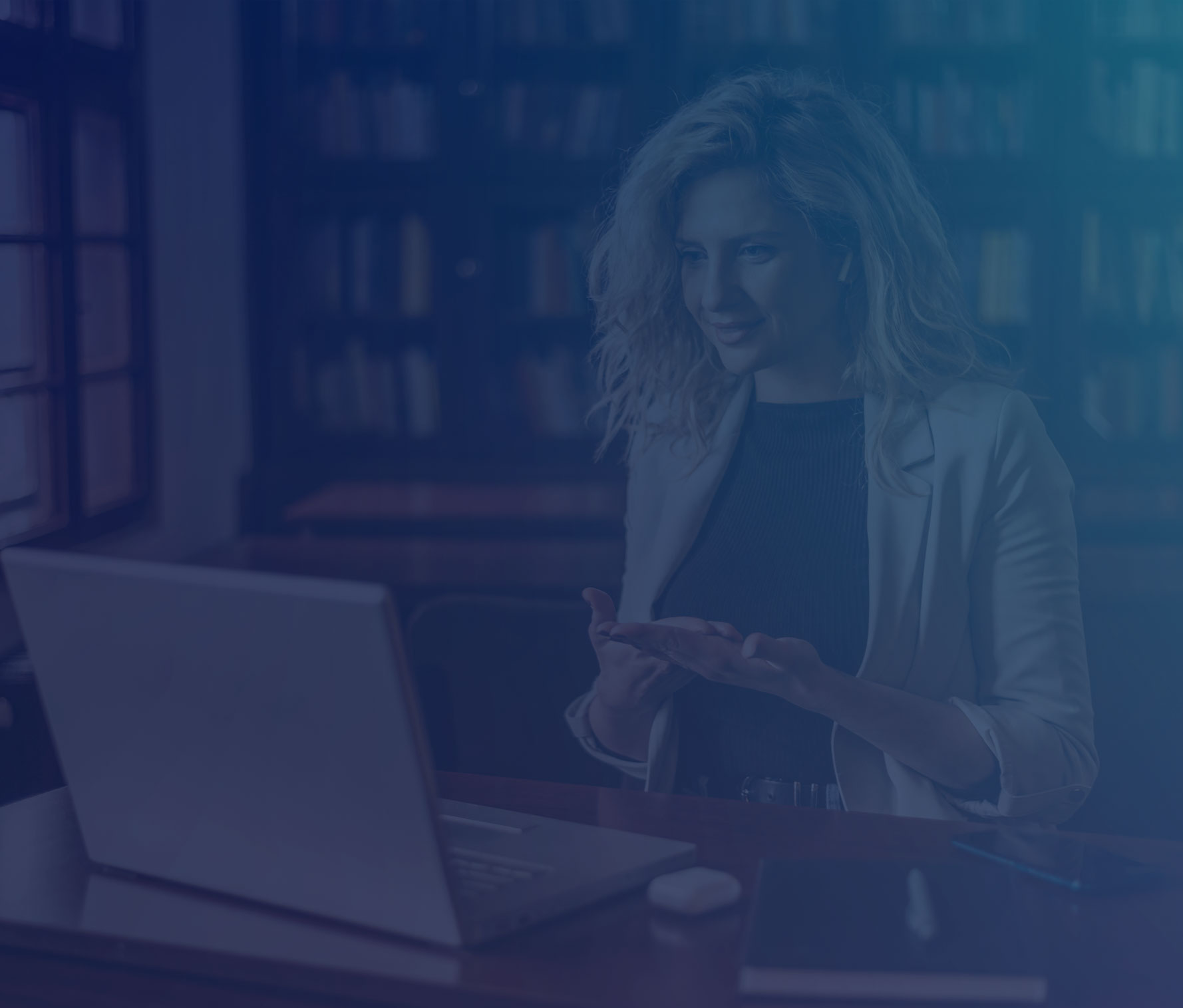 Woman presenting on a laptop during a virtual event